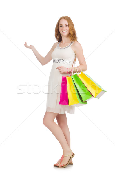 Woman after shopping spree on white Stock photo © Elnur