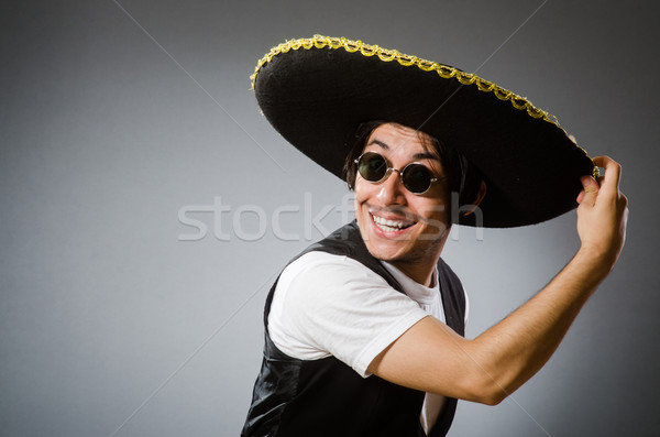 Person wearing sombrero hat in funny concept Stock photo © Elnur