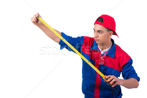 Young repairman with tape measure isolated on white Stock photo © Elnur