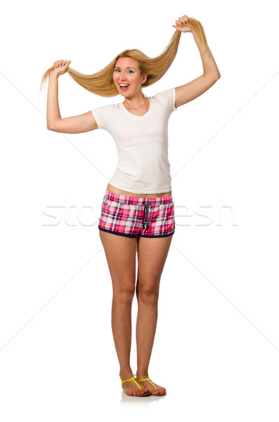 Young woman in pink plaid shorts isolated on white Stock photo © Elnur