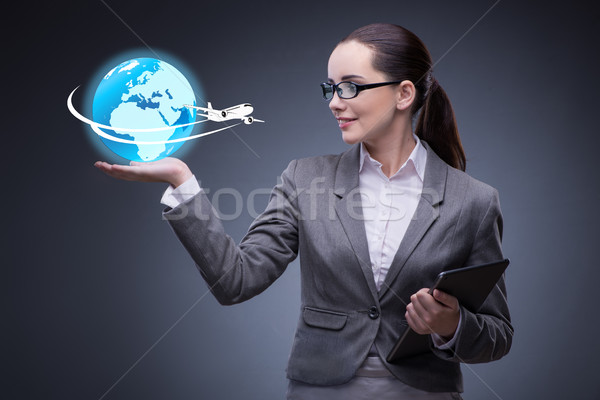 The businesswoman in air travel concept Stock photo © Elnur