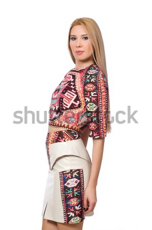Stock photo: Pretty model in clothes with carpet prints isolated on white