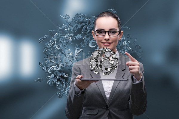 Businesswoman in time management concept Stock photo © Elnur