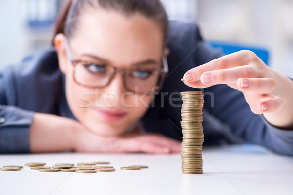 Businesswoman with coins in forex concept Stock photo © Elnur