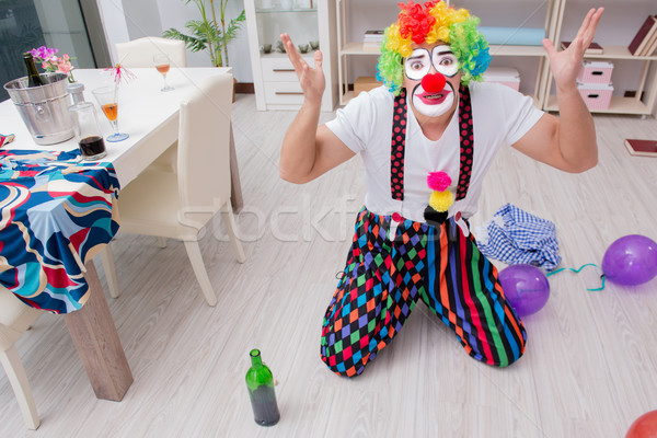 Drunk clown celebrating having a party at home Stock photo © Elnur