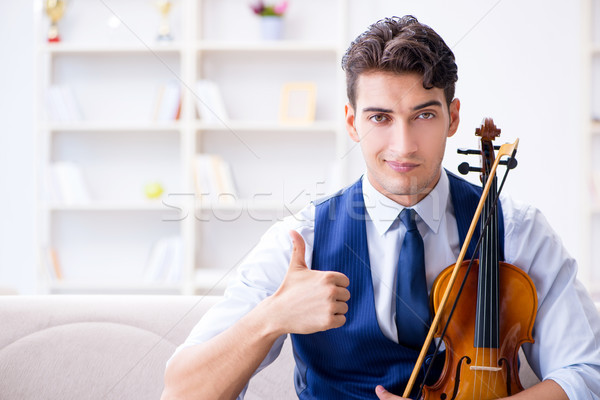 Stock fotó: Fiatal · zenész · férfi · gyakorol · játszik · hegedű