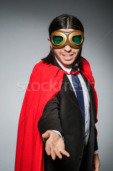 Stock photo: Superman concept with man in red cover