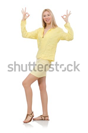 Stock photo: Pretty young woman in summer yellow clothing isolated on white