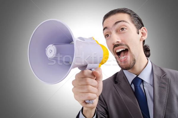 Man shouting and yelling with loudspeaker Stock photo © Elnur