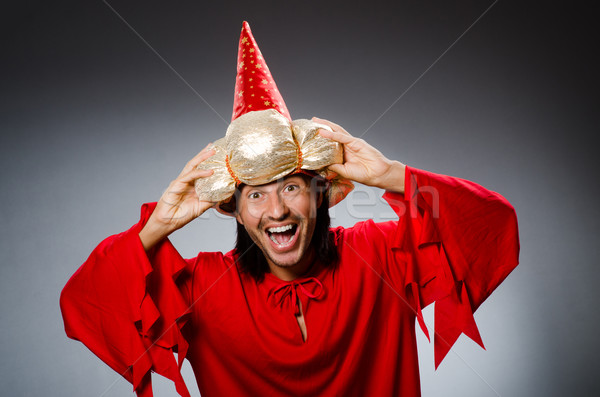 Funny wizard wearing red dress Stock photo © Elnur