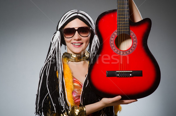 Foto stock: Guitarrista · vermelho · instrumento · música · festa · fundo