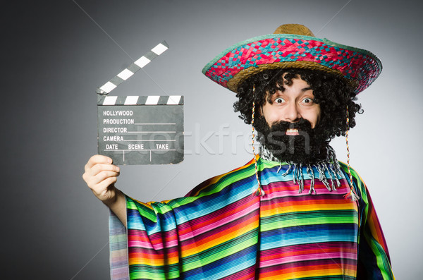 Funny hairy mexican with movie clapper Stock photo © Elnur