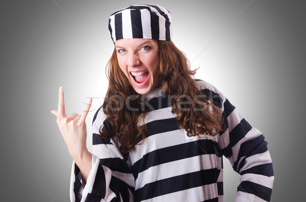 Stock photo: Convict criminal in striped uniform