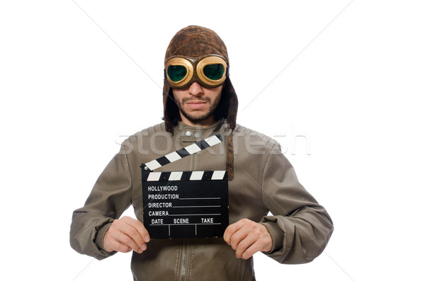 Pilot holding movie clapboard on white Stock photo © Elnur