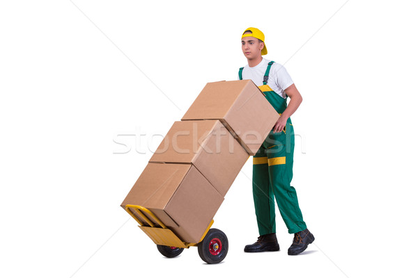 Young man moving boxes with cart isolated on white Stock photo © Elnur