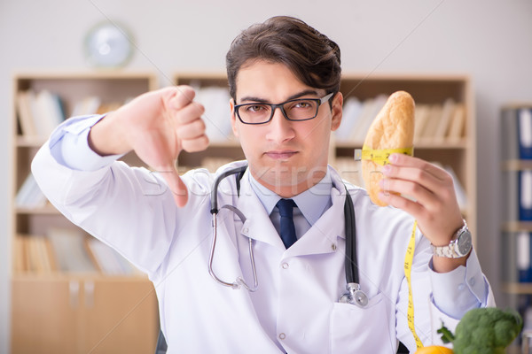 Stock photo: Scientist studying nutrition in various food