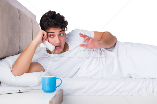 Man bed lijden slapeloosheid telefoon gelukkig Stockfoto © Elnur
