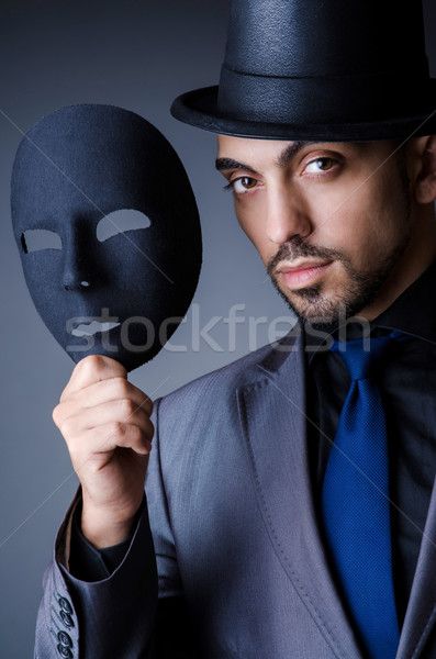 Man with black mask in studio Stock photo © Elnur