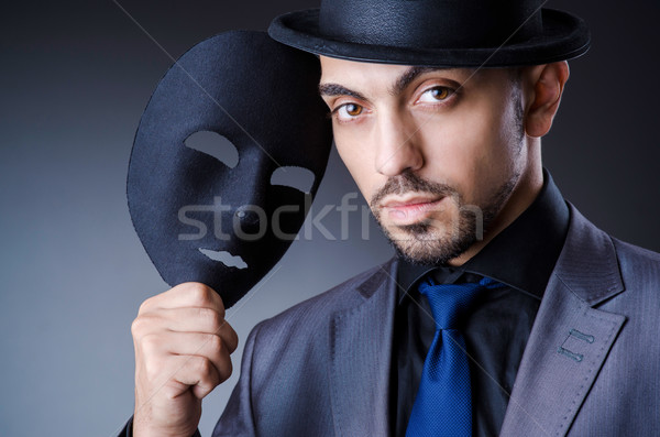 Man with black mask in studio Stock photo © Elnur