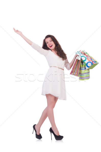 Tall girl after good shopping on white Stock photo © Elnur