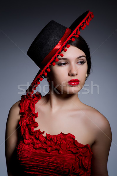 Attractive girl in red dress Stock photo © Elnur