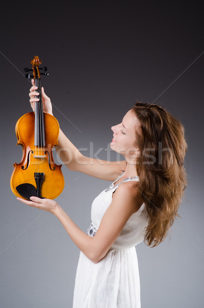 Woman artist with violin in music concept Stock photo © Elnur