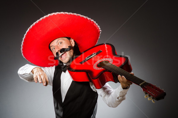 Mexican man wears sombrero isolated on white Stock photo © Elnur