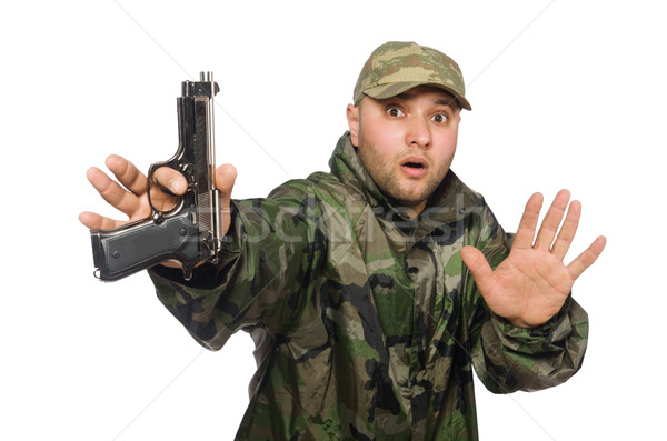 Young man in soldier uniform holding gun isolated on white Stock photo © Elnur