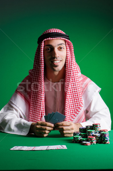 Arab uomo giocare casino verde suit Foto d'archivio © Elnur