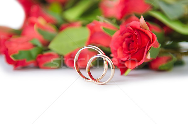Wedding rings and flowers isolated on white background Stock photo © Elnur