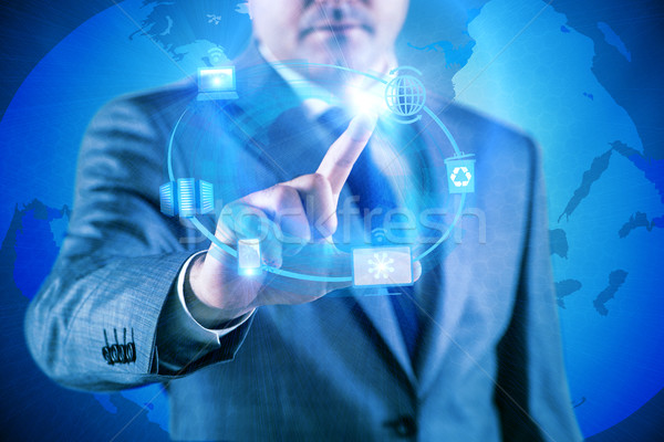 Businessman pressing buttons in computing concept Stock photo © Elnur