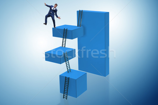 Businessman falling from high block in failure concept Stock photo © Elnur