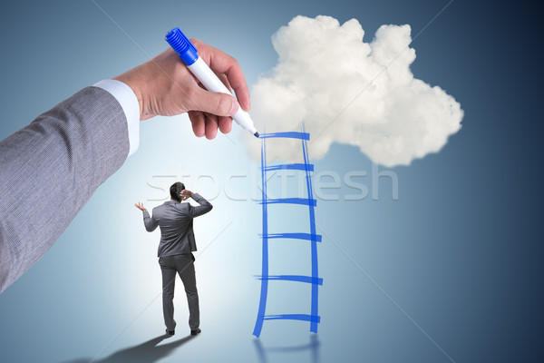 Businessman climbing career ladder in business concept Stock photo © Elnur