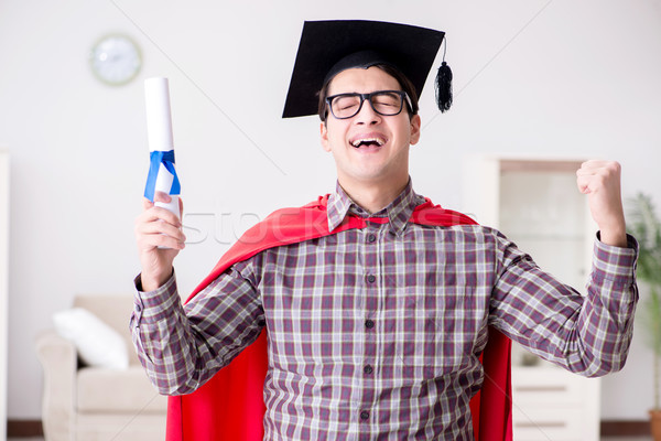 Super hero student graduating wearing mortar board cap  Stock photo © Elnur