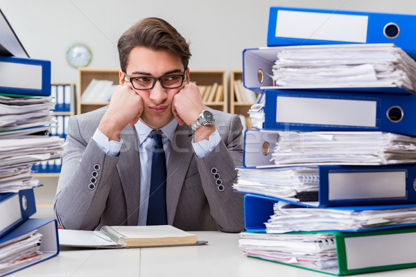 Stock photo: Busy businessman under stress due to excessive work