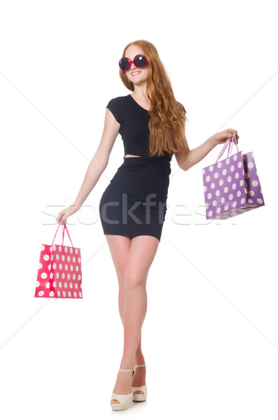 Woman after shopping spree on white Stock photo © Elnur