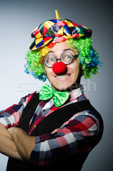 Funny clown against the dark background Stock photo © Elnur