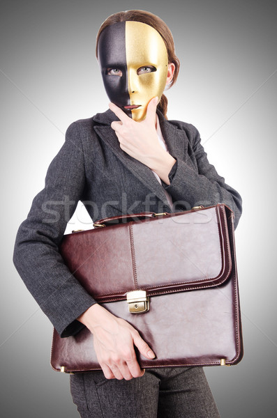 Woman with mask in hypocrisy concept Stock photo © Elnur