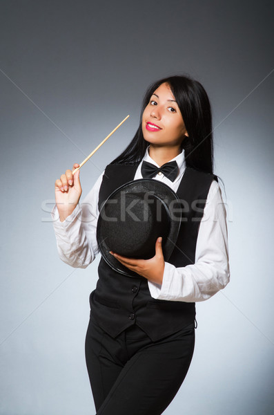 Woman magician in funny concept Stock photo © Elnur