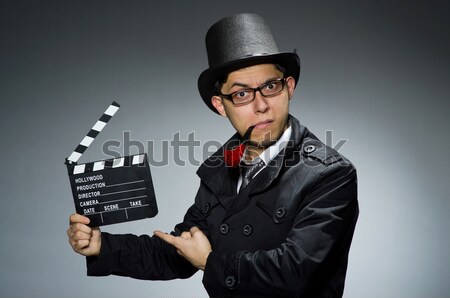 Stock photo: Businessman with gun isolated on white