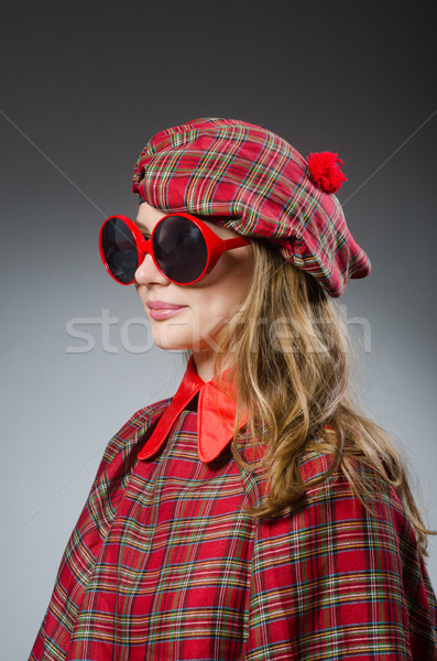 Woman wearing traditional scottish clothing Stock photo © Elnur