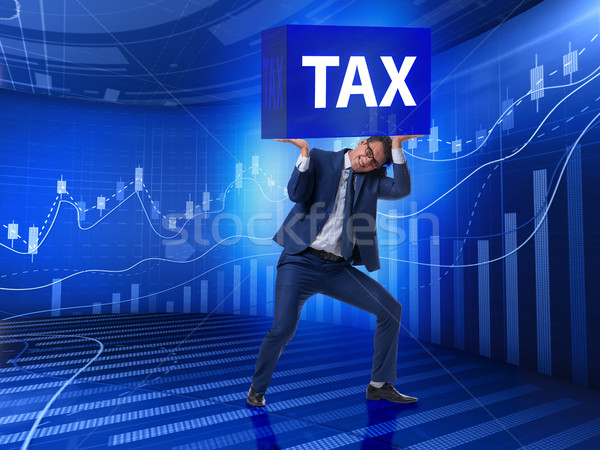 The man under the burden of tax payments Stock photo © Elnur