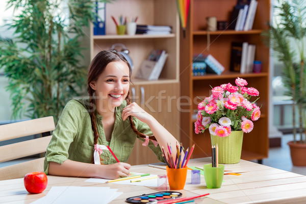 Young girl drawing pictures at home Stock photo © Elnur