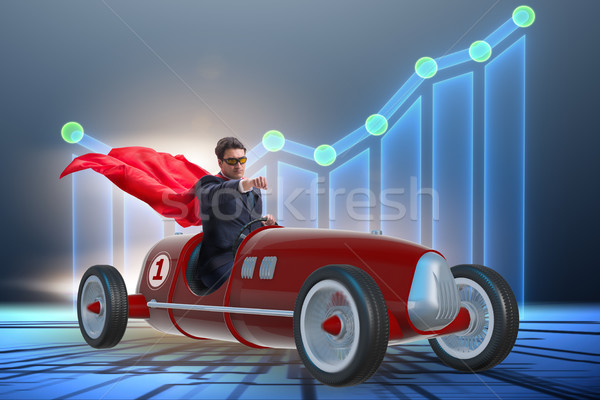 Superhero om de afaceri conducere epocă roadster sportiv Imagine de stoc © Elnur
