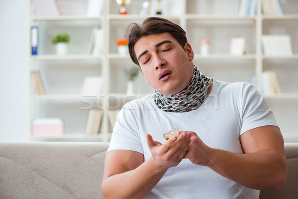 Stock photo: Young man suffering from sore throat