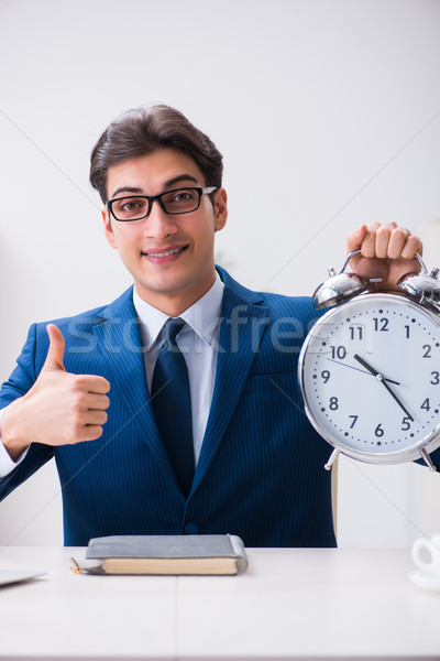 Om de afaceri angajat urgenta termenul limita alarmă ceas desteptator Imagine de stoc © Elnur