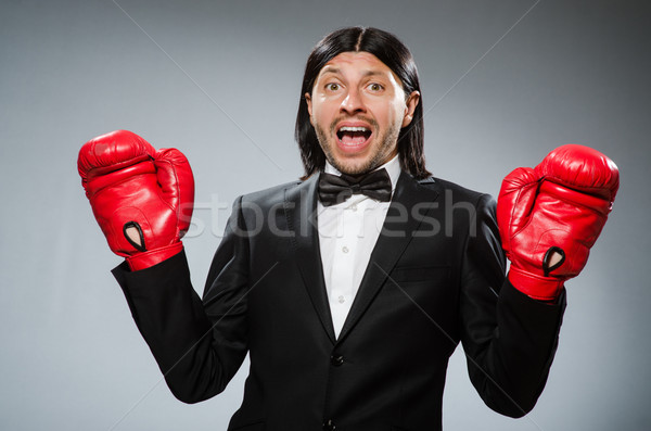 Man businessman with boxing gloves Stock photo © Elnur