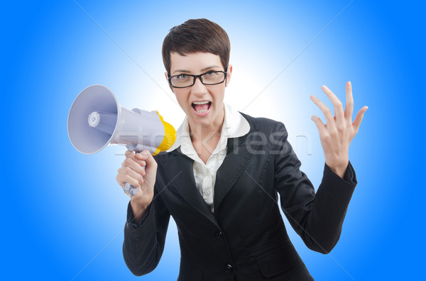Young business lady screaming to loudspeaker Stock photo © Elnur