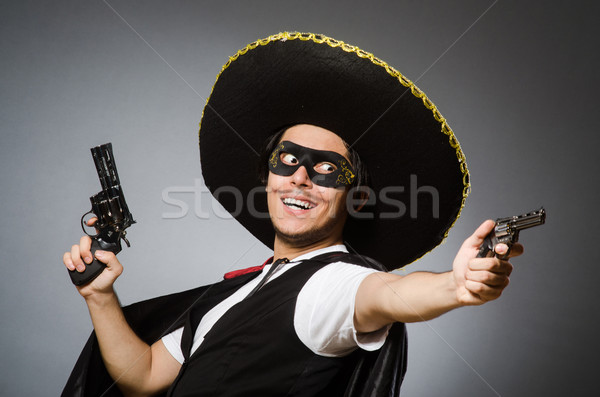 Person wearing sombrero hat in funny concept Stock photo © Elnur