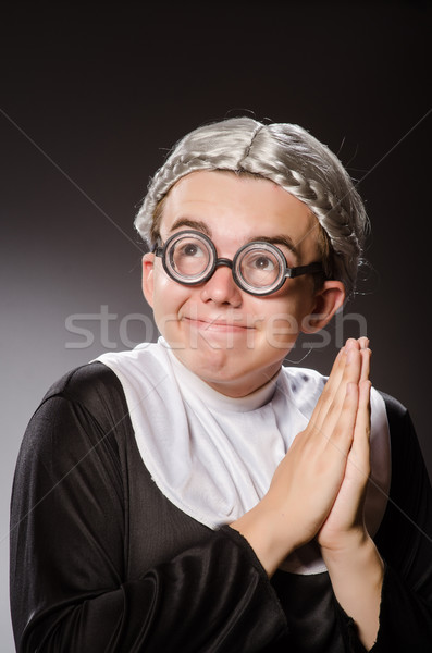 Funny man wearing nun clothing Stock photo © Elnur